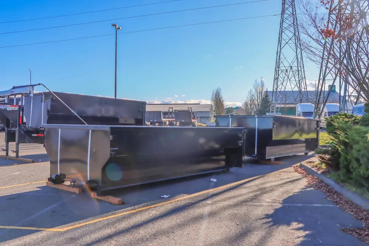 Roll-off dumpster ready for waste disposal at job site for 3 Yard Dumpster Rental in La Marque